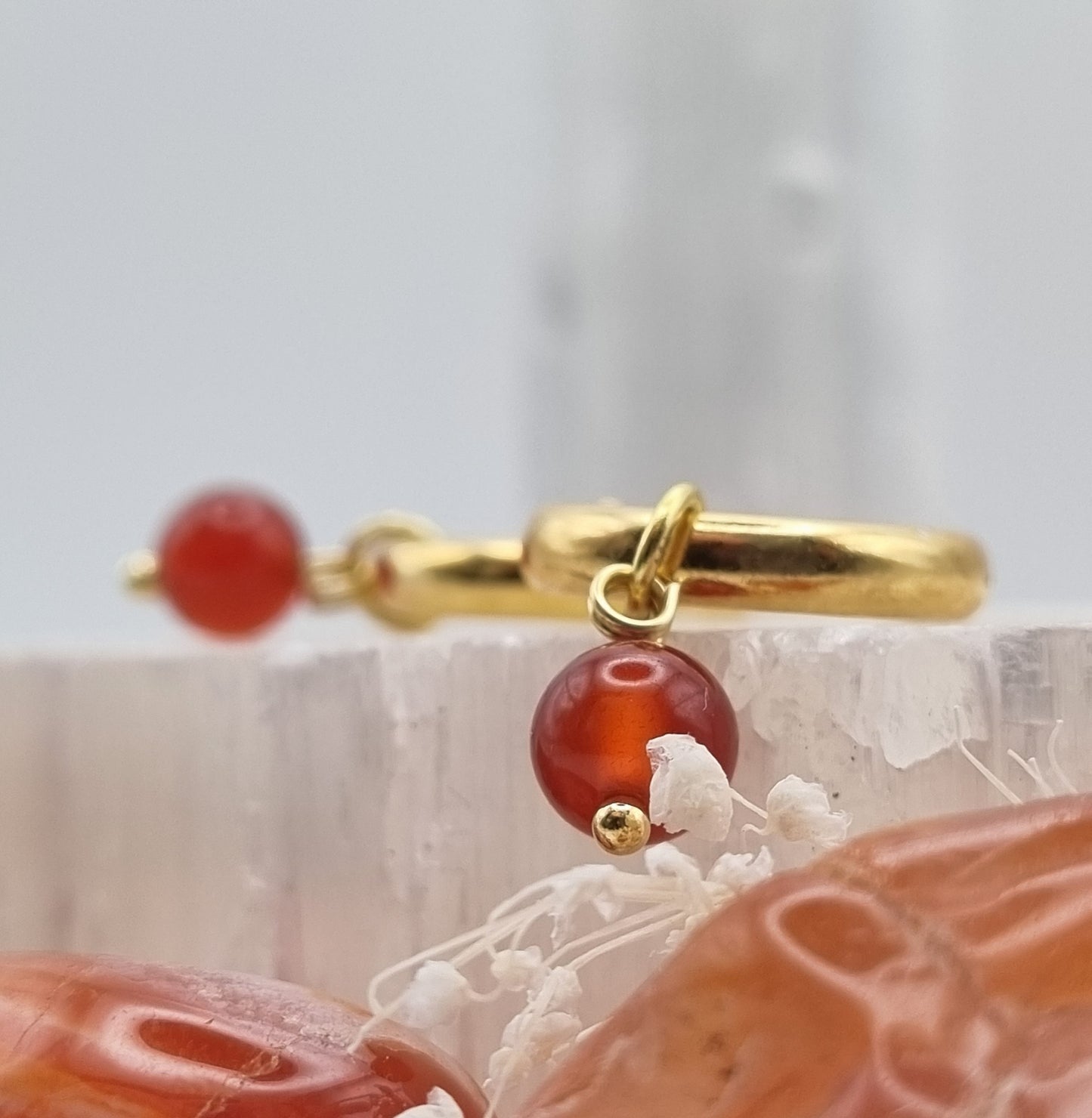 Hoop earrings with red carnelian